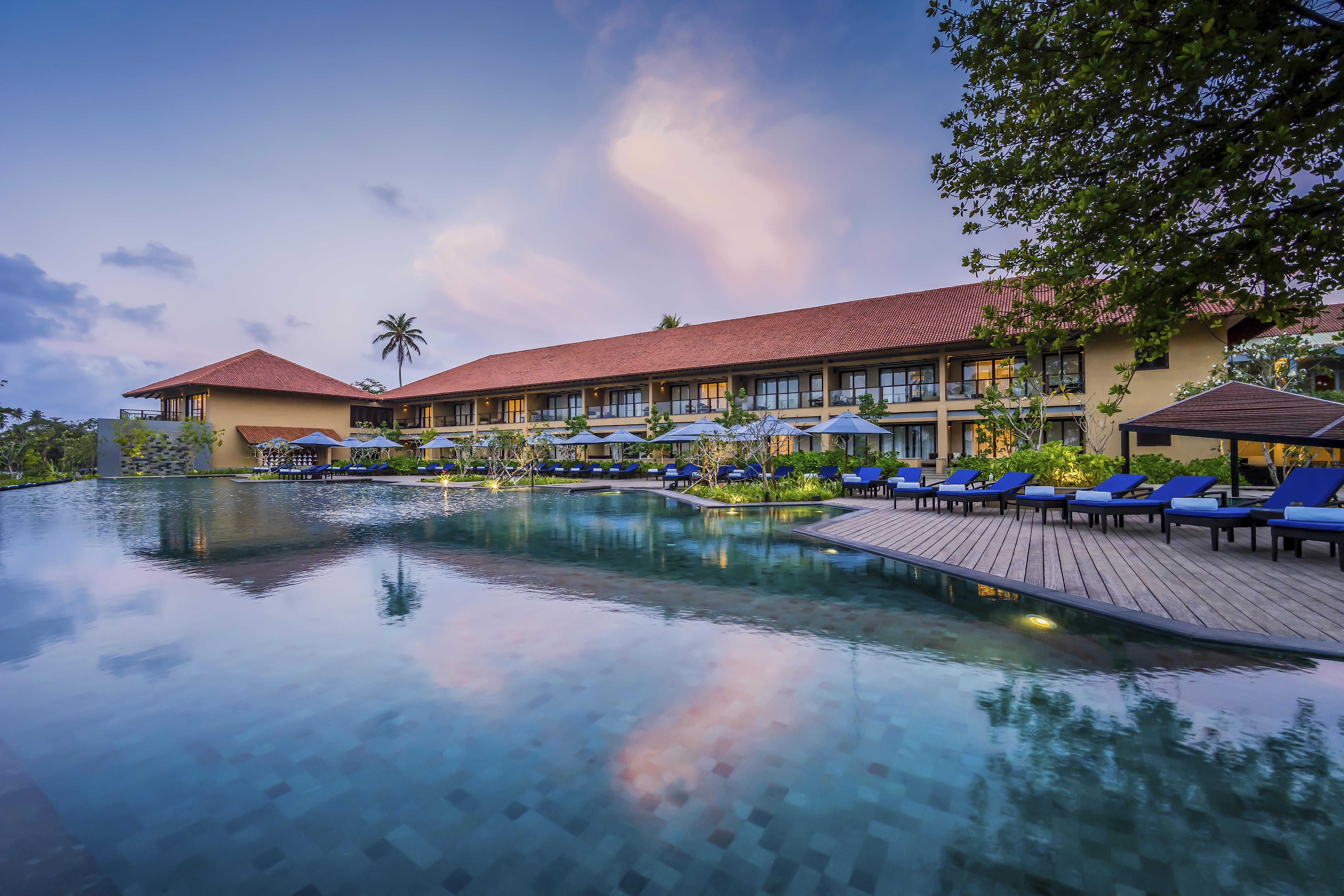 Anantara Kalutara Resort pool view at dusk