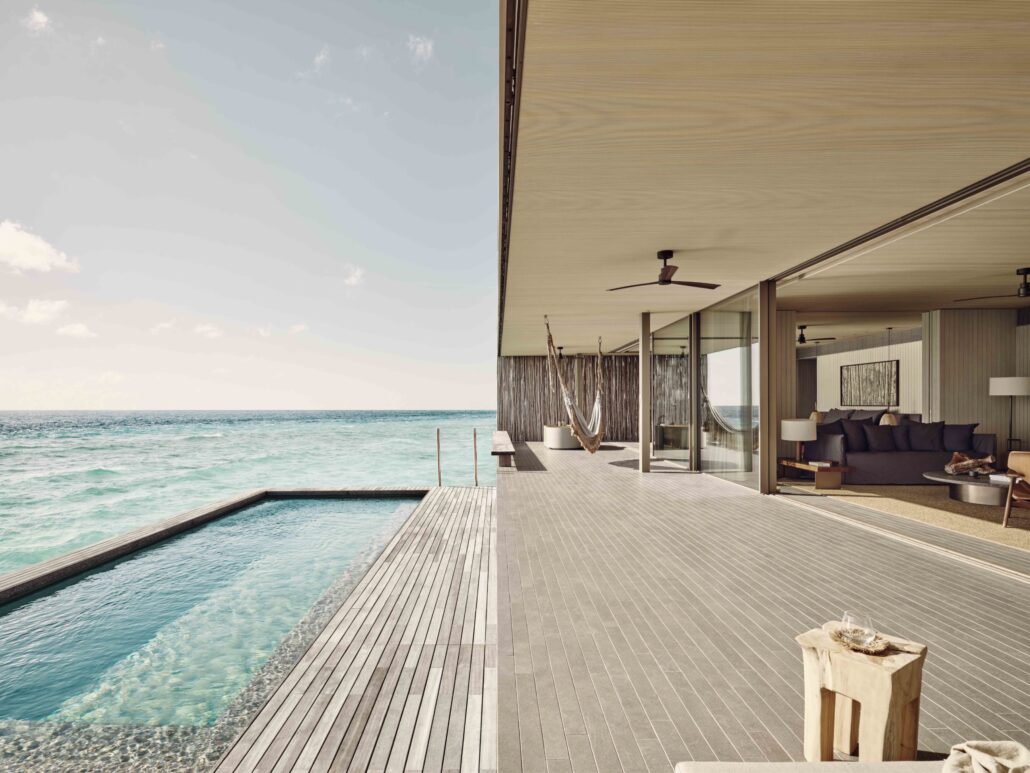 patina maldives villa two b sunset water pool exterior scaled 1