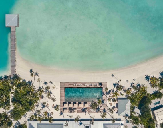 PATINA MALDIVES MAIN POOL VELI BAR POOL AERIAL