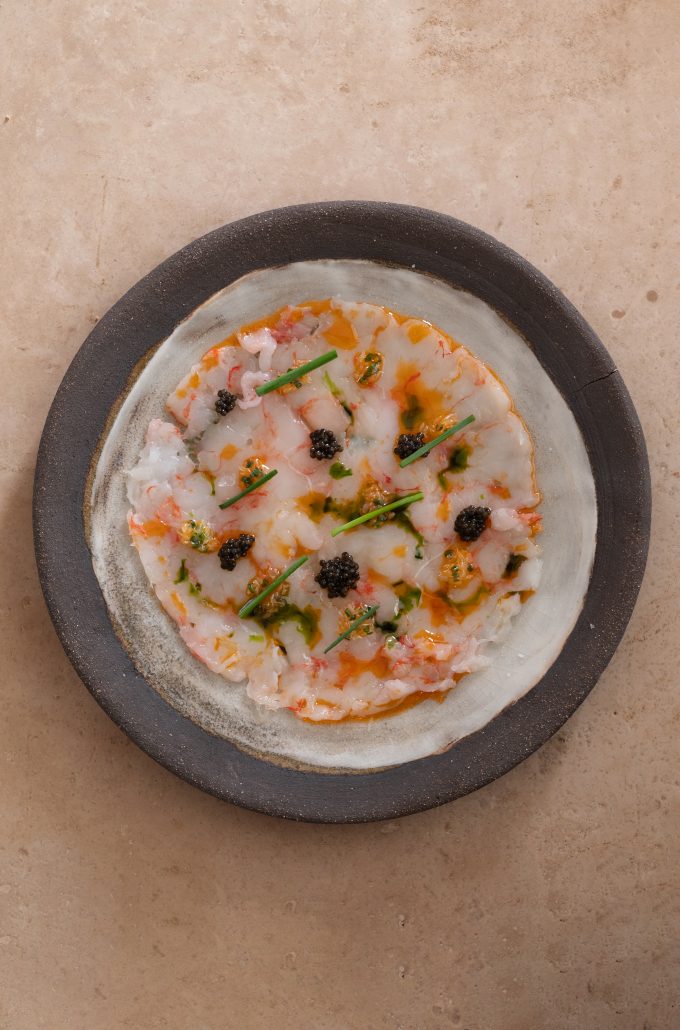 Gamba roja carpaccio caviar finger lime parsley oil