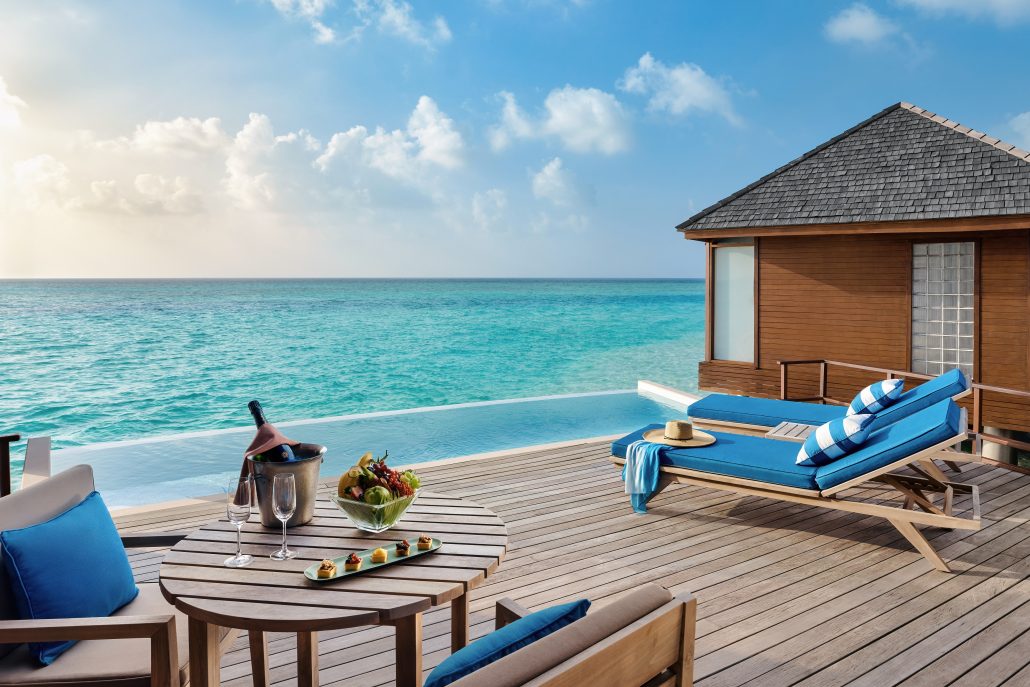 541493 Anantara Dhigu Maldives Resort Guest Room Deluxe Sunset Over Water Pool Villa Deck with LoungerscAnantara Hotels Resorts