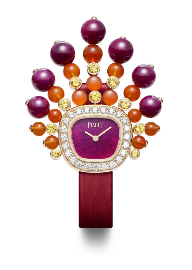 Swinging Sautoir: 750/1000 Roségold mit Brillanten (und weiteren Schmucksteinen wie Opal, Türkis). Quarzwerk. ca. 29 mm (oval/kissenförmig). ©Piaget